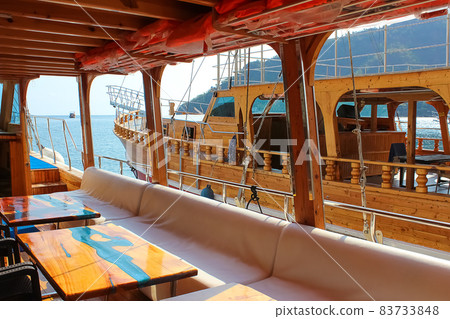 Yacht on the shore of the cozy bay of Adrasan, near Antalya and Kemer, Turkey 83733848