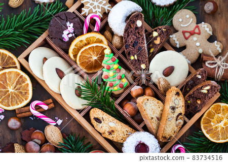 Sweet Christmas cookies in wooden box on rustic table 83734516