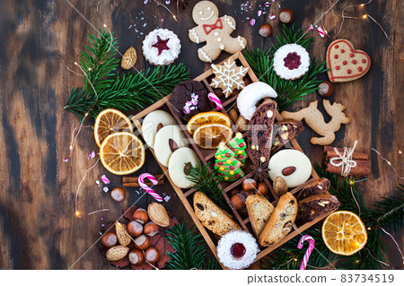 Sweet Christmas cookies in wooden box on rustic table 83734519