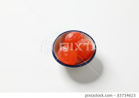 close up of salted egg yolk on white background. close up of salted egg yolk on white background. 83734623