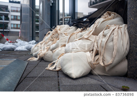 Sandbags as protection against water during floods 83736898