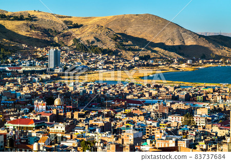 View of Puno with Lake Titicaca in Peru View of Puno with Lake Titicaca in Peru 83737684