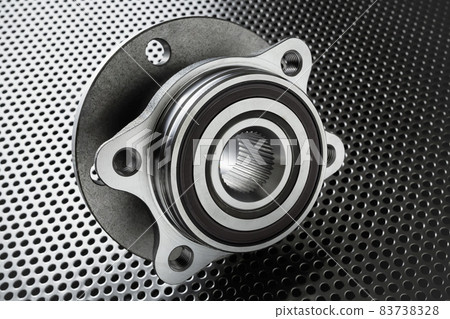 Composition of the car wheel bearing on metal surface 83738328