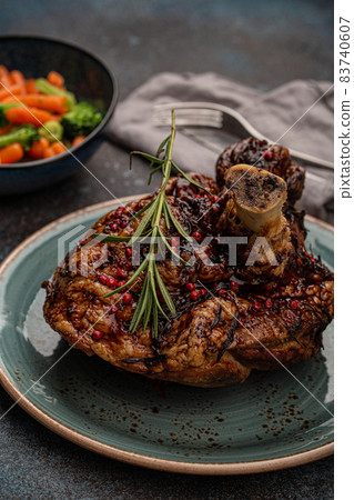 Roasted pork knuckle and salad angle view 83740607