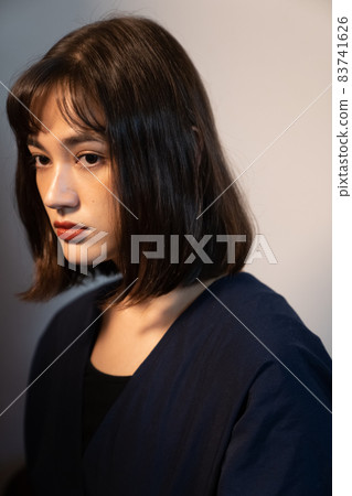 Portrait of a shaded woman 83741626