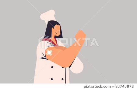vaccinated woman chef in uniform after vaccine injection successful covid-19 vaccination horizontal portrait vaccinated woman chef in uniform after vaccine injection successful covid-19 vaccination horizontal portrait 83743978