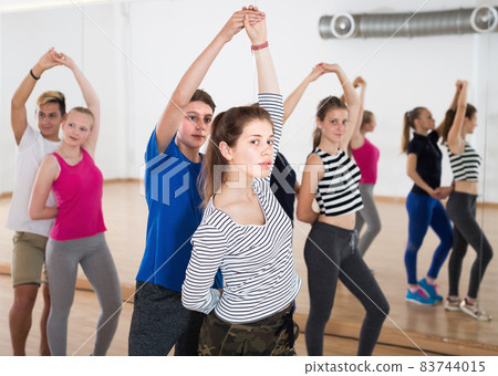 Portrait of teen boys and girls leaning partner dance Portrait of teen boys and girls leaning partner dance 83744015