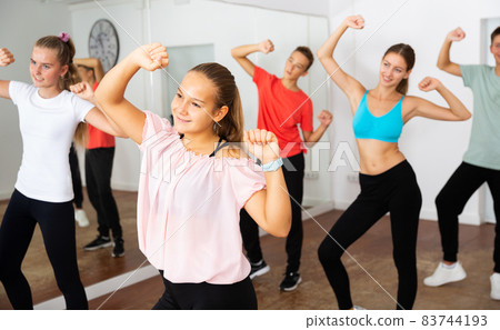 Teen girl training dance in choreography class Teen girl training dance in choreography class 83744193