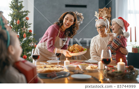 family celebrating Christmas family celebrating Christmas 83744999