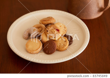 German pastry cookies on a cute plate German pastry cookies on a cute plate 83745849