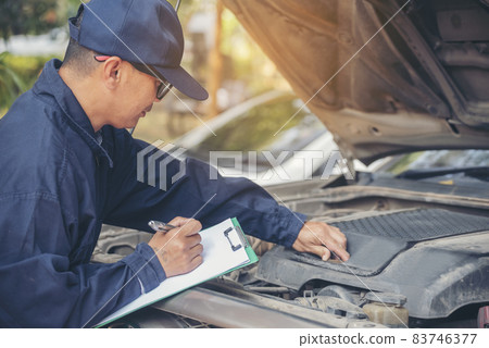 Mechanic car service auto garage in automotive mobile center. Technician workshop repair engine motor vehicles service mechanical engineering business. Automobile mechanic hands car repairs technic Mechanic car service auto garage in automotive mobile center. Technician workshop repair engine motor vehicles service mechanical engineering business. Automobile mechanic hands car repairs technic 83746377