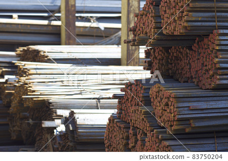 Metal profiles of different kinds are located in the metal products warehouse Metal profiles of different kinds are located in the metal products warehouse 83750204