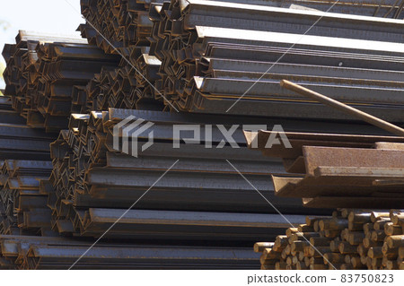 Metal profiles of different kinds are located in the metal products warehouse Metal profiles of different kinds are located in the metal products warehouse 83750823