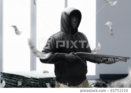 Criminal man in a hidden mask holding the shotgun while robbery the money Criminal man in a hidden mask holding the shotgun while robbery the money 83751510