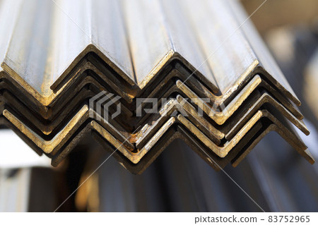 Metal profile angle in packs at the warehouse of metal products Metal profile angle in packs at the warehouse of metal products 83752965