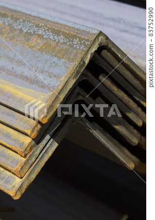 Metal profile angle in packs at the warehouse of metal products Metal profile angle in packs at the warehouse of metal products 83752990