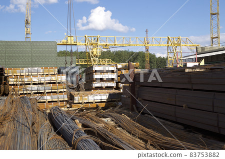 Metal profiles of different kinds are located in the metal products warehouse Metal profiles of different kinds are located in the metal products warehouse 83753882
