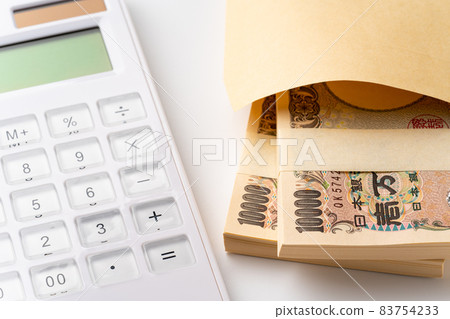 Banknote and calculator in an envelope 83754233