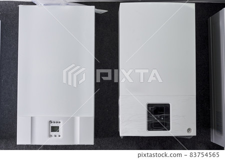 Dual-circuit gas boiler. Gas boiler for home heating. Wall double-bithermic boiler for heating and hot water Dual-circuit gas boiler. Gas boiler for home heating. Wall double-bithermic boiler for heating and hot water 83754565