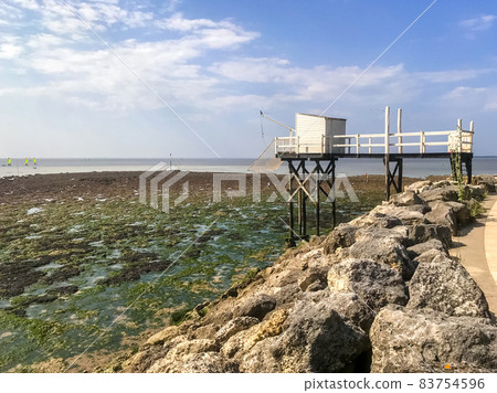 Traditional fishing cabin and net - Carrelet - Saint Georges de Didonne, France Traditional fishing cabin and net - Carrelet - Saint Georges de Didonne, France 83754596