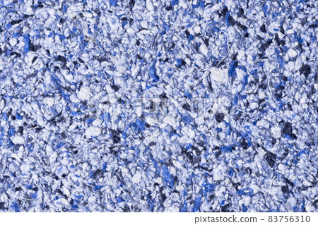 Abstract textured wallpaper. Decorative texture. Colored texture of liquid wallpaper to cover wall surface. Colored abstract background. Abstract texture of decorative plaster liquid wallpaper 83756310
