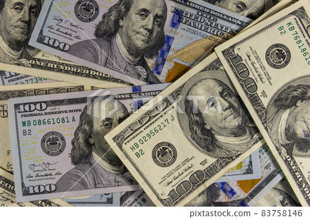 Background of one hundred dollar bills 83758146