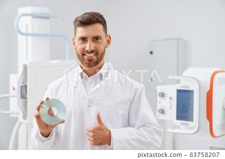 Doctor showing finger up after ultrasound examine. 83758207