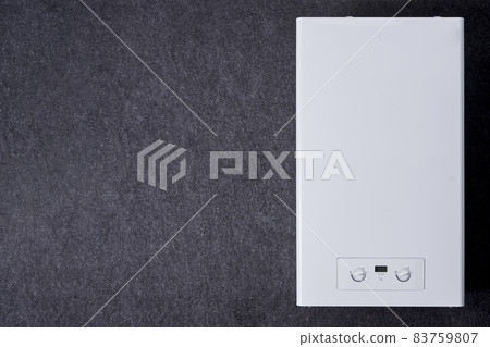 Dual-circuit gas boiler. Gas boiler for home heating. Wall double-bithermic boiler for heating and hot water Dual-circuit gas boiler. Gas boiler for home heating. Wall double-bithermic boiler for heating and hot water 83759807