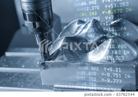 The abstract scene CNC milling machine rough cutting the mold and die parts and G-code data background. The abstract scene CNC milling machine rough cutting the mold and die parts and G-code data background. 83762544