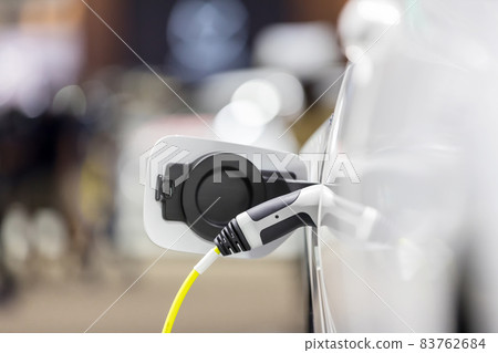 Electric car charging station.  83762684