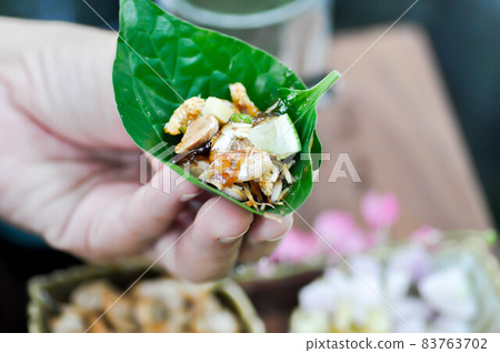 rolls or Miang kham ,traditional Southeast Asian snack from Thailand and Laos rolls or Miang kham ,traditional Southeast Asian snack from Thailand and Laos 83763702