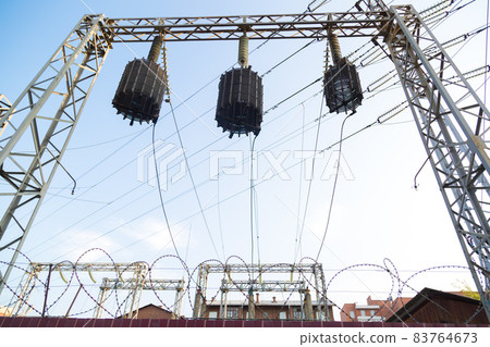 Energy nodes and parts under high voltage on the background of the sky Energy nodes and parts under high voltage on the background of the sky 83764673