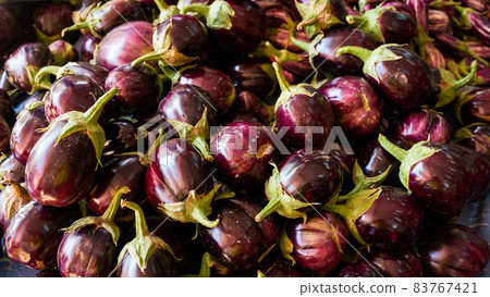 Pile of round eggplants at the bazaar. Pile of round eggplants at the bazaar. 83767421