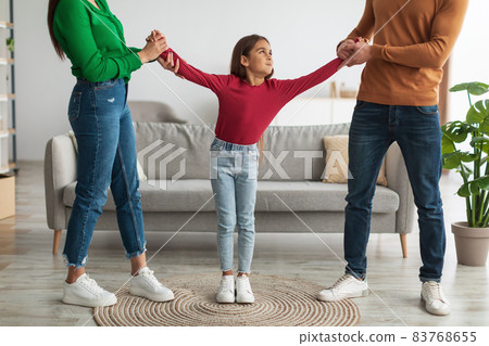Divorce. Angry parents fighting over their child 83768655