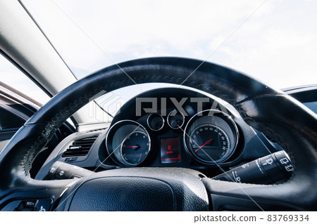 Speed background. Car dashboard panel with speedometer, tachometer. Fast vehicle, no limit concept. 83769334