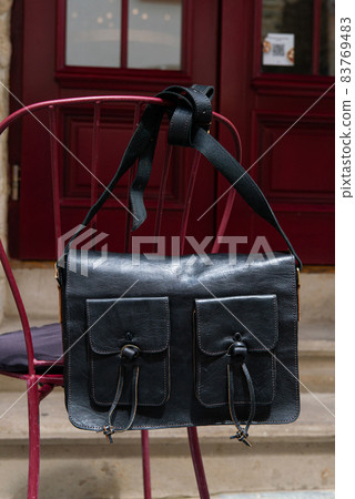close-up photo of black leather bag corporate. close-up photo of black leather bag corporate. 83769483