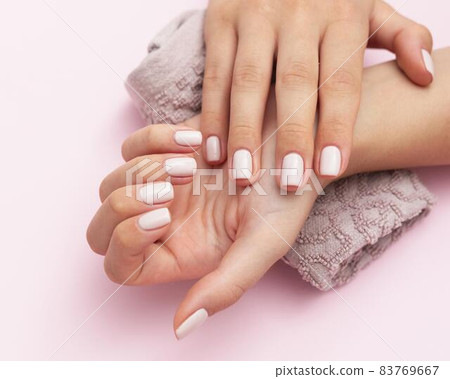 woman showing her beautiful nails. High quality beautiful photo concept woman showing her beautiful nails. High quality beautiful photo concept 83769667