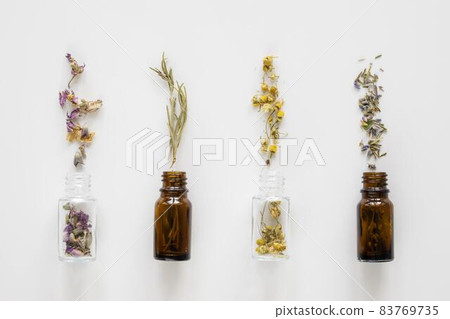 top view natural medicinal herbs bottles. High quality beautiful photo concept top view natural medicinal herbs bottles. High quality beautiful photo concept 83769735