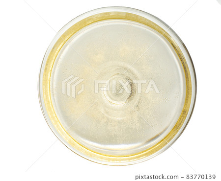 one glass champagne close up top view. champagne coupe close up top view. Many tiny bubbles in a glass of champagne. one glass champagne close up top view. champagne coupe close up top view. Many tiny bubbles in a glass of champagne. 83770139