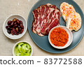 Plate with Bulgarian salami - babek, cheese and chutney 83772588