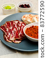 Plate with Bulgarian salami - babek, cheese and chutney 83772590