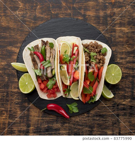 top view fresh mexican food with lime. High quality beautiful photo concept top view fresh mexican food with lime. High quality beautiful photo concept 83775990
