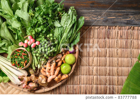 Fresh organic Southeast Asian vegetables and spices from local farmer market, Thailand 83777788