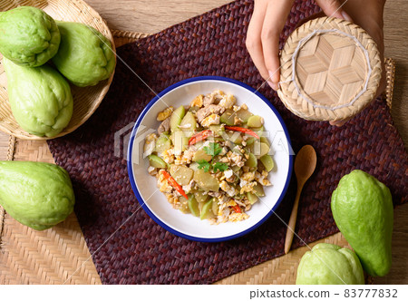Northern Thai food, Stir fried chayote squash with egg and pork, Local Thai food, Table top view 83777832