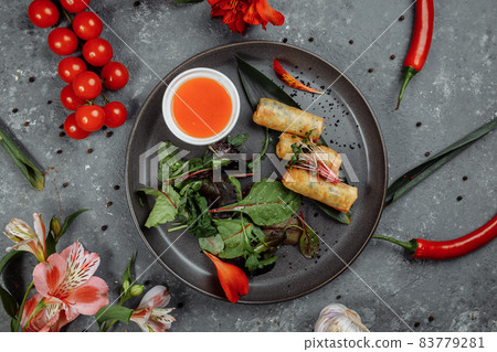 Spring rolls with shrimp with sweet chili sauce. Asian cuisine Spring rolls with shrimp with sweet chili sauce. Asian cuisine 83779281