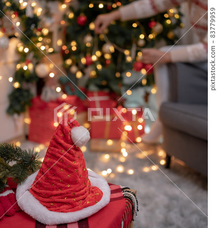 Christmas decoration at home. Xmas and New Year celebration for party on holiday. Christmas decoration at home. Xmas and New Year celebration for party on holiday. 83779959