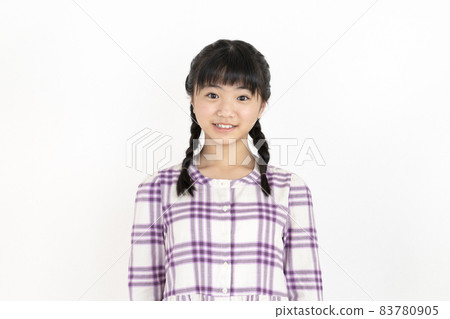 10-year-old girl looking at the camera portrait 83780905