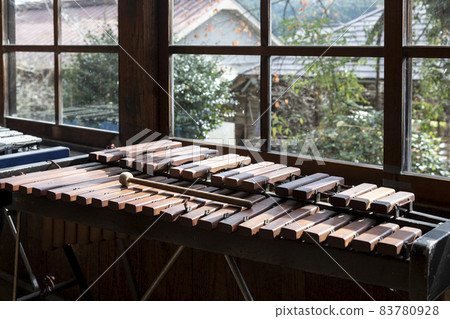 A retro xylophone on the windowsill with autumn air [nostalgic music room] 83780928
