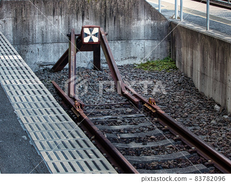Train bollard (railroad bollard) diagonally in front 83782096