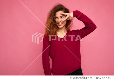 Portrait of young emotional positive happy smiling beautiful brunette curly woman with sincere Portrait of young emotional positive happy smiling beautiful brunette curly woman with sincere 83785630